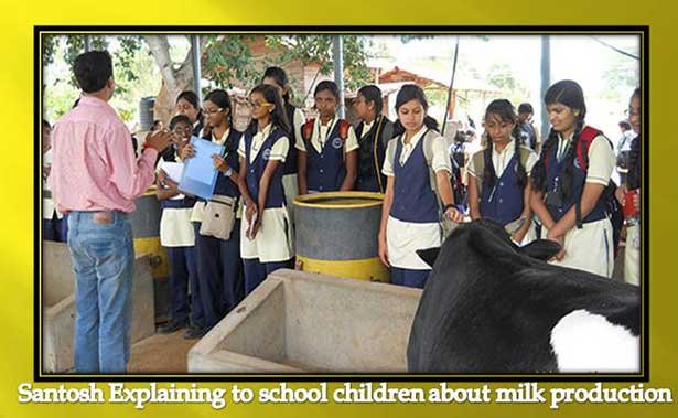 Santosh D Singh explaing about-milk-production-to-school-childrens